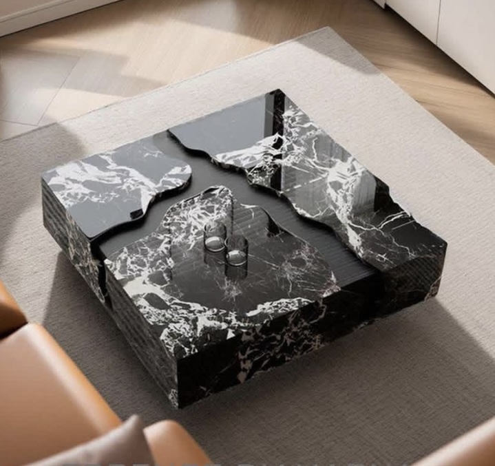 Sculpted black marble piece — Stones